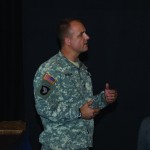 US Army Maj. Paul Denson discusses the role of rape in war at Tuesday's Women's Center presentation.