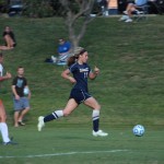 Sophomore midfielder Jillian Russell shows off her speed as she moves the ball down the field. || File photo