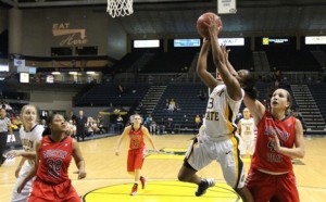 Freshman guard Erica Sisk atempts a layup against Austin Peay defenders. || Photo courtesy of Sports Information