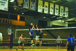 Team Jesus sets up to return a Lizo spike. This is the third year the team earned the intramural championship title. || Torrey Perkins/The News