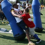 The Racers allowed the children to work on their tackling skills.