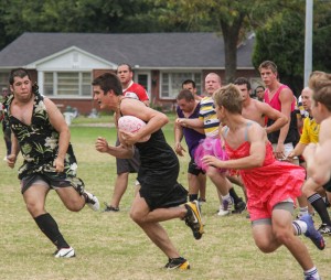 Lori Allen // The News The rugby team plays its match Saturday in dresses to attract attention to the sport. It hopes to make the event a tradition. Murray State won the match 60-19.