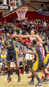 Sophomore forward, Jeffery Moss (31), attempts a field goal against SIUE's strong defense.
