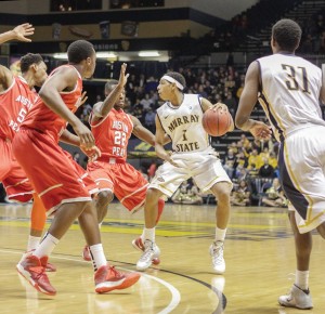 Lori Allen/The News Freshman point guard Cameron Payne (1) looks for an open teammate in the Racers’ win against Austin Peay Saturday.