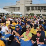 Families eat and enjoy barbecue at the Family Weekend Picnic behind Roy Stewart Stadium.