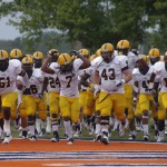 No. 7 Ja-Vonta Trotter leads the Racers on to the field against UT-Martin last Thursday in Martin.