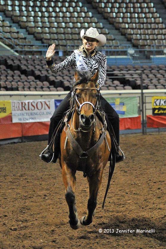 Photo courtesy of Kaitlyne DavisKaitlyne Davis, graduate student from Kevil, Ky., waves to the crowd during the Miss Rodeo USA?pageant. Davis won third runner-up and the horsemanship­ award.  