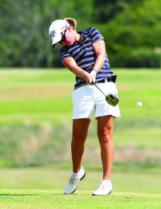 Freshman Abbi Stamper follows through with her swing. The women were coming off of first and second place finishing at their previous two matches, but struggled Monday and Tuesday due to weather.­ || Photo courtesy of Sports Information