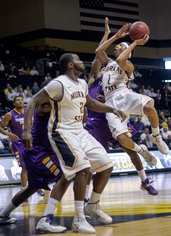 Lori Allen / The News Freshman guard Cameron Payne (1) goes up for a shot during the game against the Tennessee Tech Golden Eagles Thursday night.