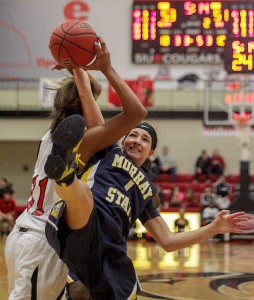 Lori Allen / The News Taylor Porter (1), freshman guard from Louisa, Ky., is overtaken by an SIUE player during the game there on Saturday.