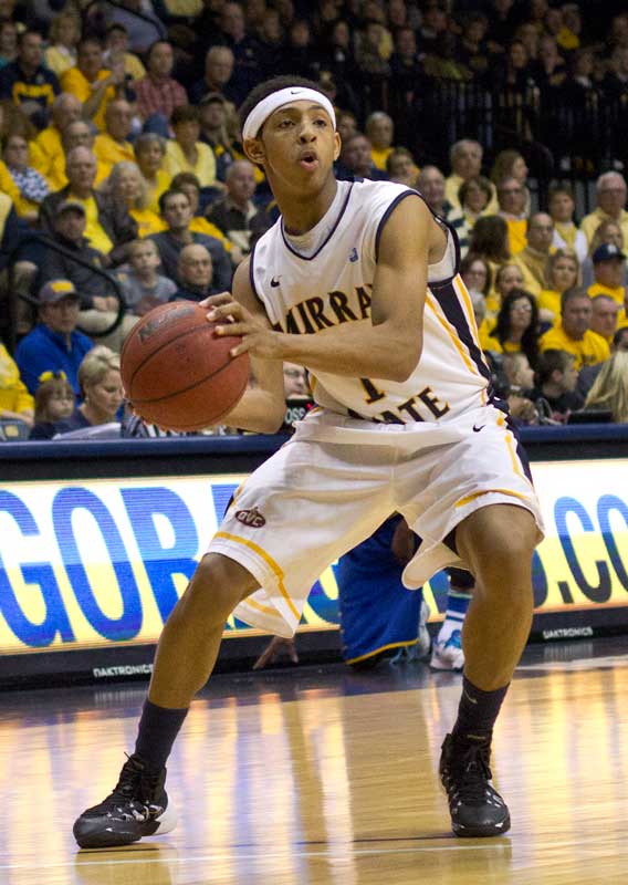 Fumi Nakamura/The News Freshman point guard Cameron Payne looks to pass the ball in a game earlier this year.