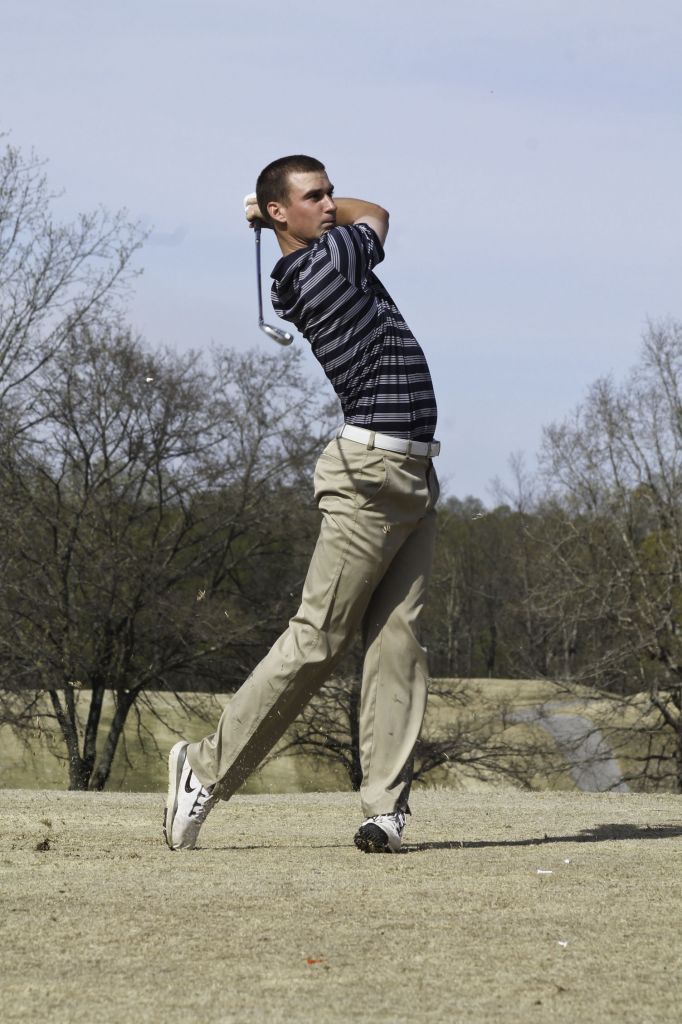 Fumi Nakamura/The News Junior Brock Simmons tees off at practice last week at Miller Memorial Golf Course.