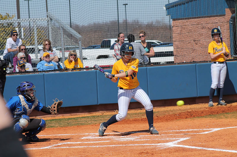 Jenny Rohl/The News Freshman Jocelyn Rodgers swings at a pitch in the Racers’ doubleheader against Tennessee Tech.