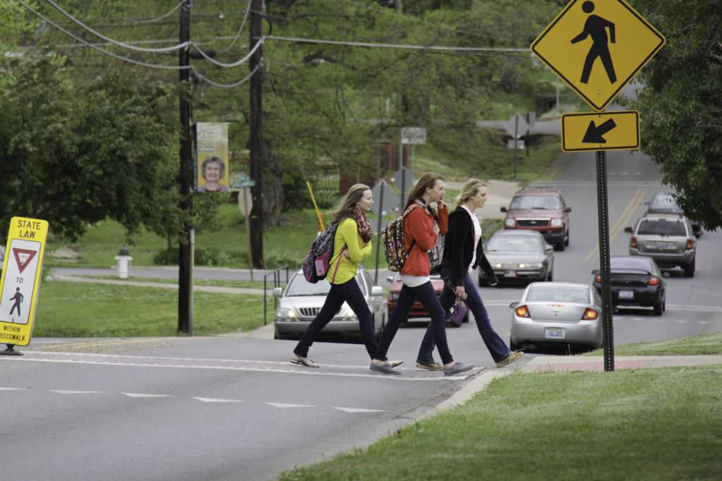 Lori Allen/The News Students cross 16th Street to get to class.