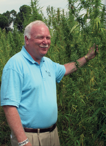 Bruce Schreiner/AP Photo In this Aug. 1, 2014 photo, Tony L. Brannon, Murray State University’s agriculture dean, stands for a photo near a hemp crop at the school’s research farm in Murray, Ky. Researchers and farmers are producing the state’s first legal hemp crop in generations. Hemp has turned into a political cause in the Bluegrass state.