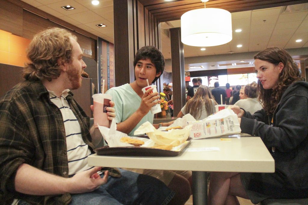 Jenny Rohl/The News Students find a table in the busy restaurant and sit down to enjoy the McDonald’s food they have been without all summer.