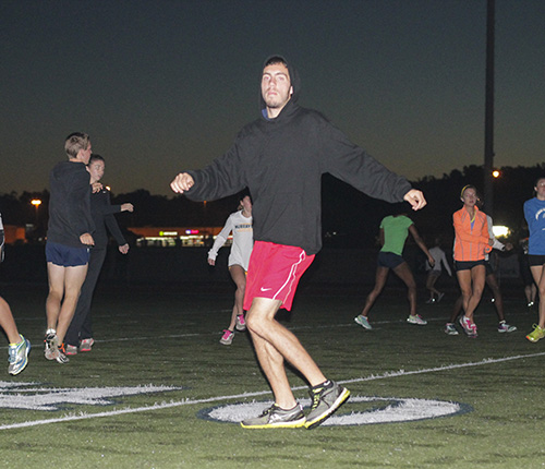 Jenny Rohl/The News Freshman Mark Venura practices agilities with the cross country team at Stewart Stadium Sept. 24.