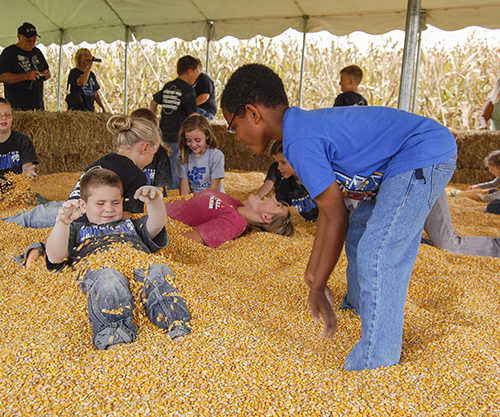 File Photo Children enjoy the corn pit at the annual Fall on the Farm event last year at Stanley Pullen Farm. The event is operated by Murray State students. 