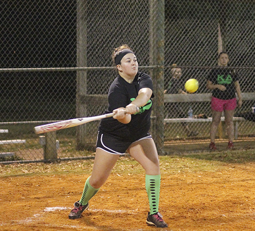 Jenny Rohl/The News Cierra Massengale, sophomore from Benton, Ky., bats for Kappa Delta Tuesday night against Regents Residential College.