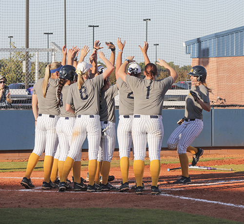Jenny Rohl/The News The Racers celebrate the end of their 5-1 season at the Racer Field.