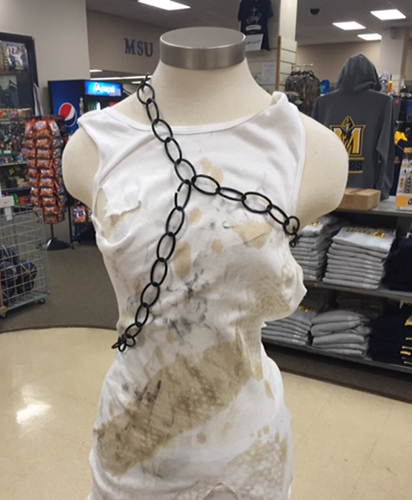 Photo submitted by Adrien Argentero A mannequin dressed in chains and rugged clothes represents those trafficked.  