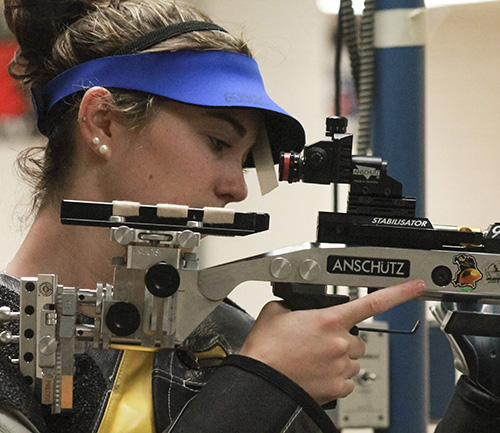 Jenny Rohl/The News Senior Kelsey Emme practices shooting Wednesday at Pat Spurgin Rifle Range.