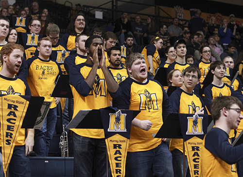 Jenny Rohl/The News The Racer Pep Band cheers on the Racers Saturday night at the CFSB Center during their 91-72 victory over Tennessee State. Regular basketball game attendance is expected of its members, according to RacerBand.com.