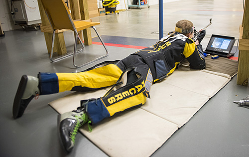 Kory Savage/The News Freshman Ivan Roe from Manhattan, Mont., practices a prone position for smallbore before the team’s match Saturday against Columbus State and Jacksonville State on Sunday.