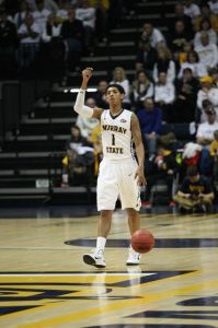 Haley Hays/The News Sophomore point guard Cameron Payne leads the Racer offense as he takes the ball downcourt.