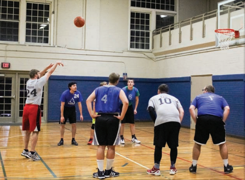 Nicole Ely/The News A Team Lob City player throws a free throw during an intramural game.