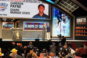 Mallory Tucker/The News Cameron Payne shakes NBA Commissioner Adam Silver's hand after being picked 14th overall by the Oklahoma City Thunder.