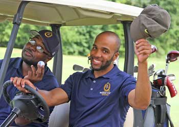 Photo Courtesy of Murray State Athletics Graduate assistant, Jewuan Long drives the golf cart during the Hoopalooza golf tournament on August 8.