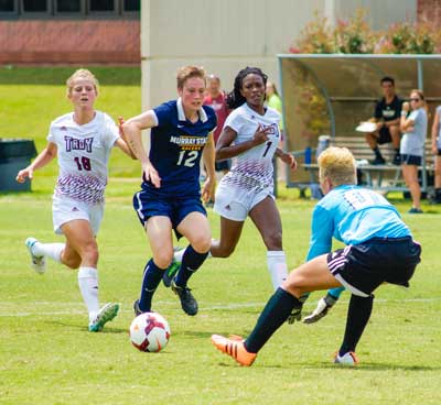 Zachary Maley/The News Harriet Withers, sophomore forward from Murwillumbah, Australia stakes a shot during the Racers’ first game of the season against Troy Aug. 15. Withers scored one of the two winning goals against Mississippi State in last week’s guarantee game in Starkville.