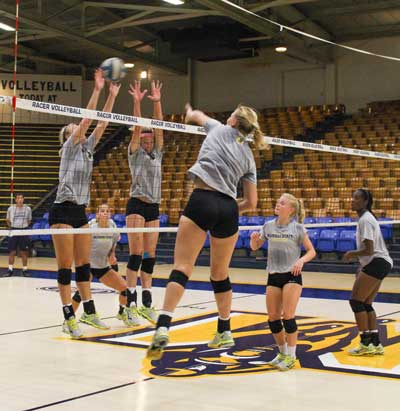Nicole Ely/The News Racer volleyball practices before the Holiday Inn Classic, which will be held on Sept. 11-12.