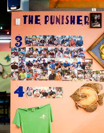 Zachary Maley/The News Burrito Shack boasts the Punisher Wall of Fame proudly.