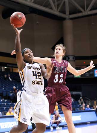 Jenny Rohl/The News Jashea Lee, senior forward, goes up for a layup in the 70-57 loss to SIU on Wednesday.