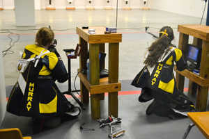 Chalice Keith/The News WITHROW INVITATIONAL: Freshman Alathea Sellars from Puryear, Tennessee kneels in position. Sellars shot a career high 594 in air rifle and a 576 in small bore.