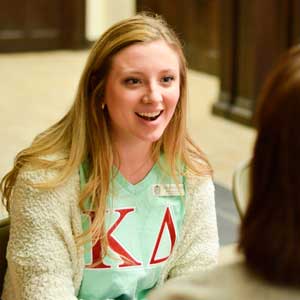 Emily Harris/The News Kappa Delta member Anne-Riley Meade speaks to a potential new member.