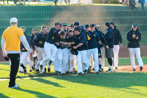 Kalli Bubb and Jenny Rohl/The News The Murray State baseball team celebrates after winning a game last season. 