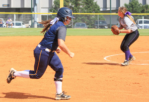 Kalli Bubb/The News A Murray State softball player runs to first base after hitting the ball in a game this fall.
