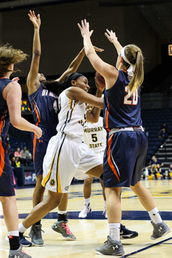 Nicole Ely/The News Senior forward Kyra Gulledge drives to the basket in Saturday’s loss to UT Martin.