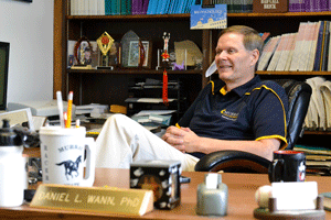 Chalice Keith/The News Daniel Wann, the recipient of this year’s Distinguished Professor Award, sits in his office. 