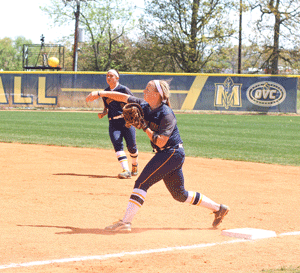 Nicole Ely/The News Junior infielder Jessica Twaddle throws the ball to third base in the team’s Saturday loss. 
