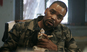 Photo courtesy of screenrant.com  Cheddar (Method Man) cuddles Keanu, the gangster cat, in a sit down with his original owners in newly released ‘Keanu.’